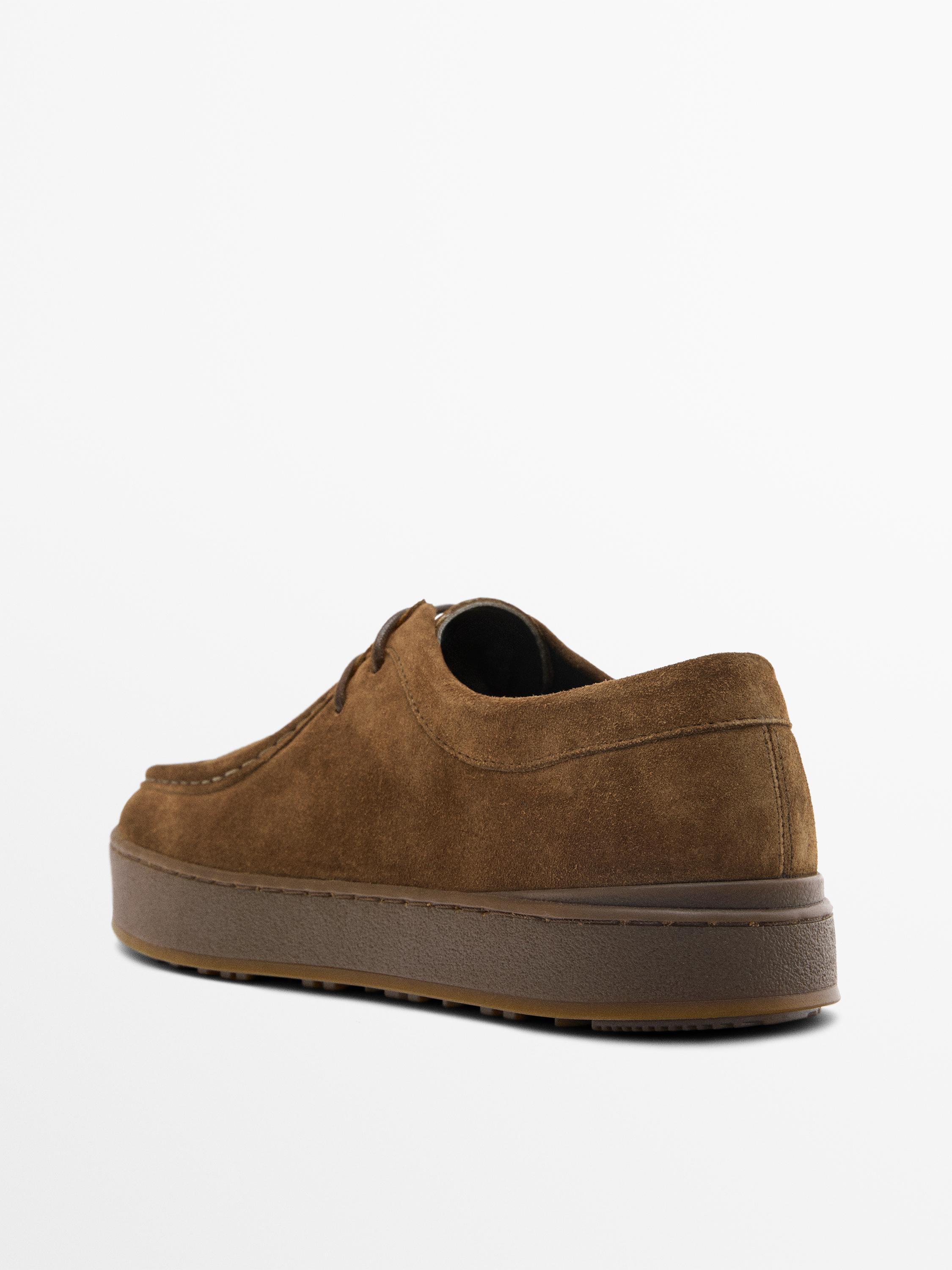 Leather shoes with moc toe and chunky sole